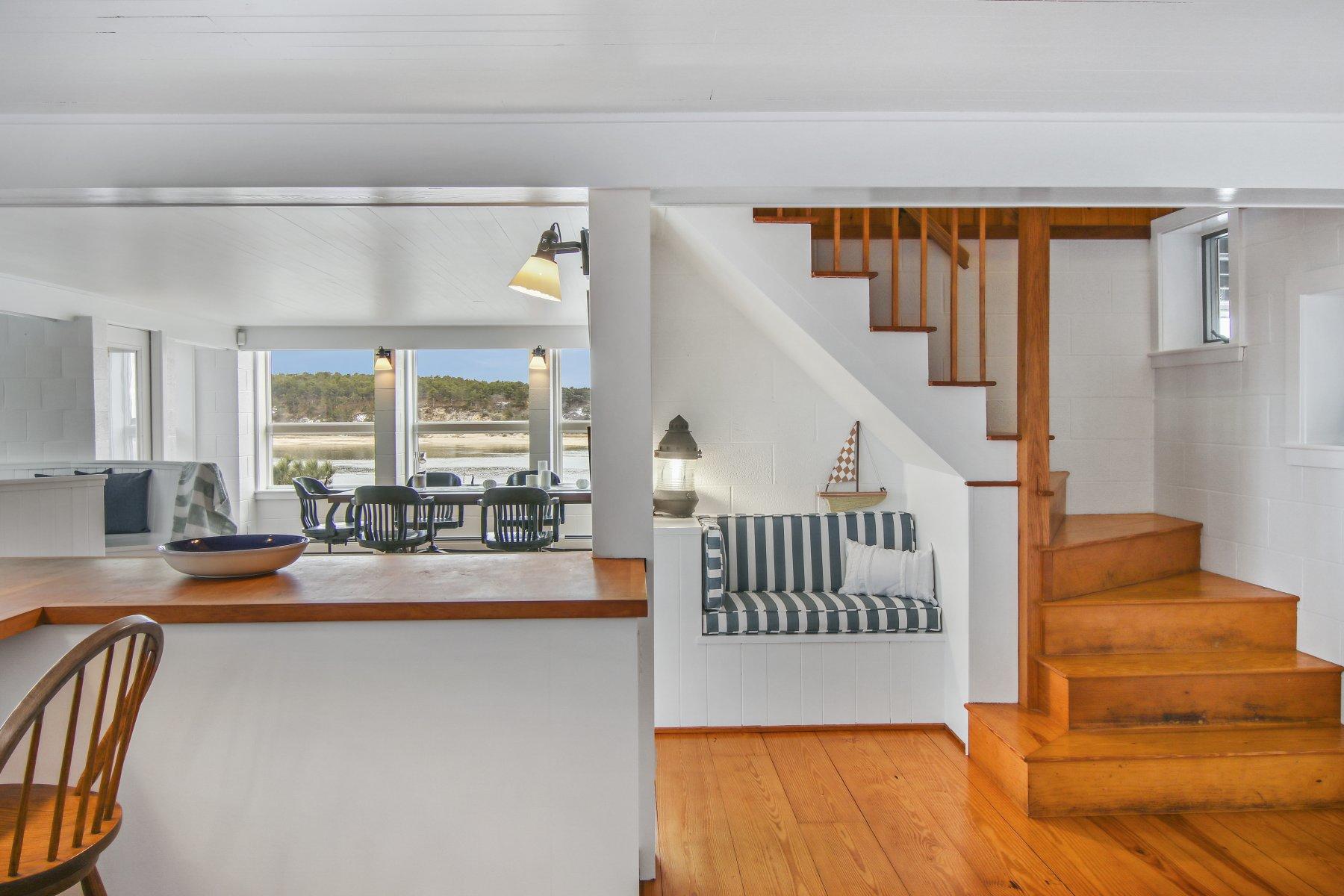 925 Chequessett Neck Road Wellfleet, MA 02667 - Photo 14 of 47 a view of entryway and hall with wooden floor