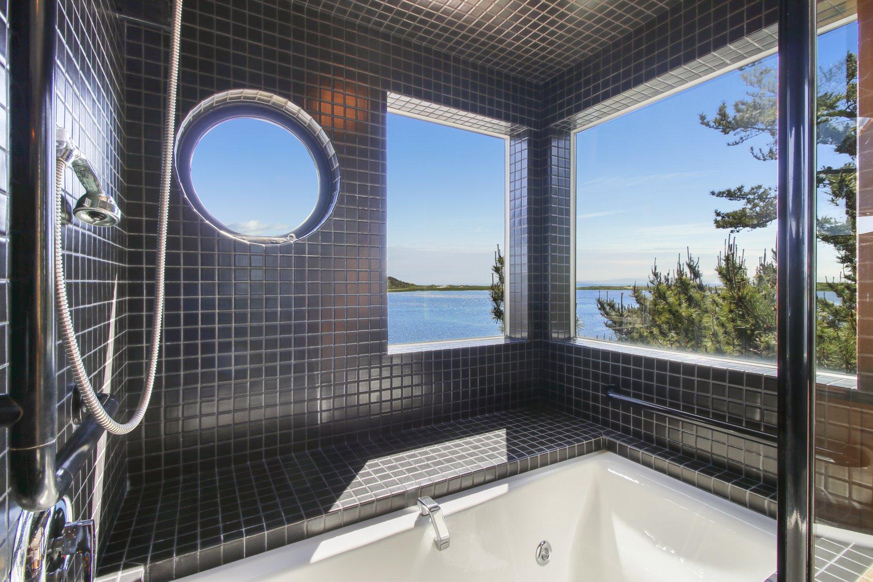 925 Chequessett Neck Road Wellfleet, MA 02667 - Photo 30 of 47 a bathroom with a sink and a mirror