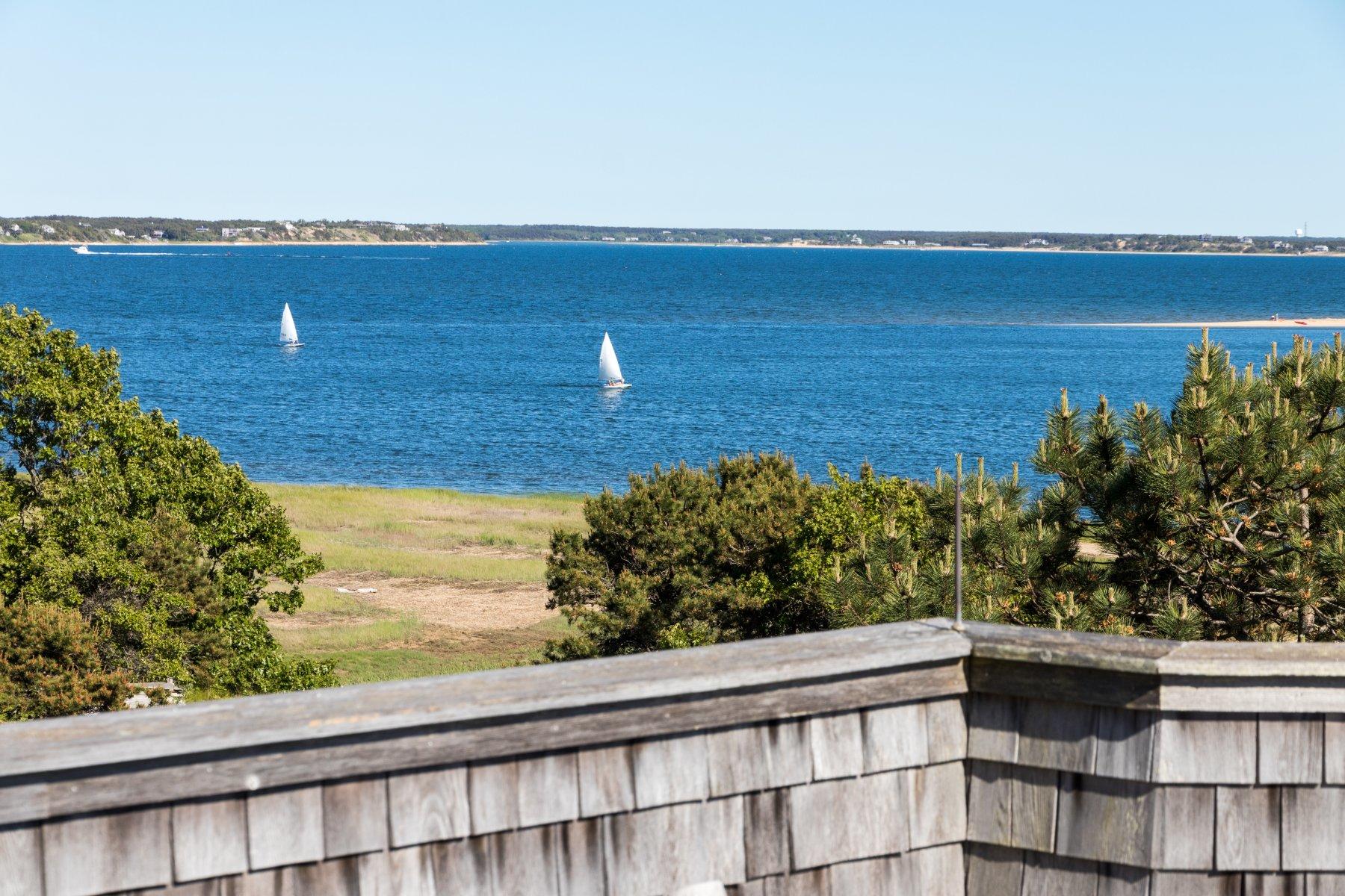 925 Chequessett Neck Road Wellfleet, MA 02667 - Photo 47 of 47 a view of a floor to ceiling window and an ocean view