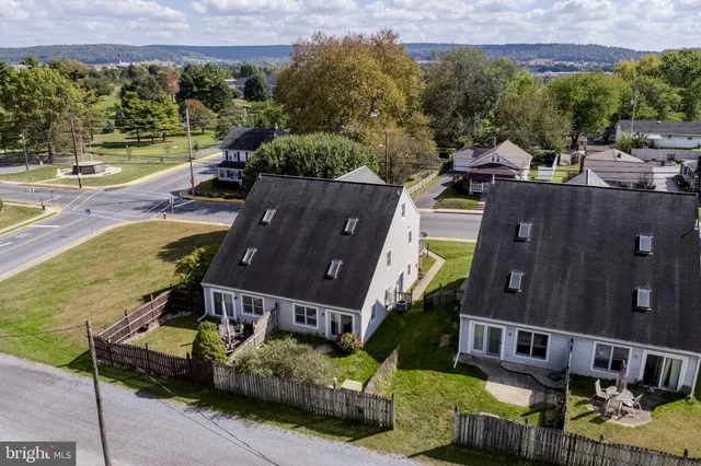 an aerial view of a house with a garden view
