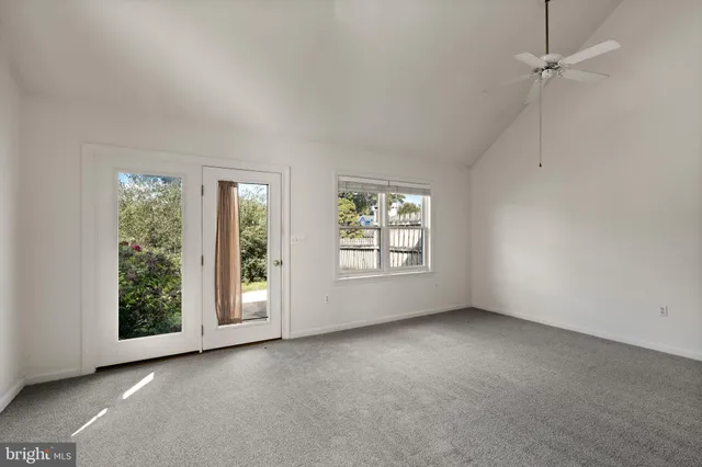 an empty room with windows