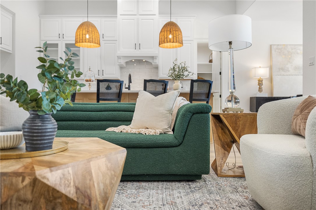 5034 Toscana Loop Bryan, TX 77802 - Photo 13 of 41 a living room with furniture potted plant and a large window