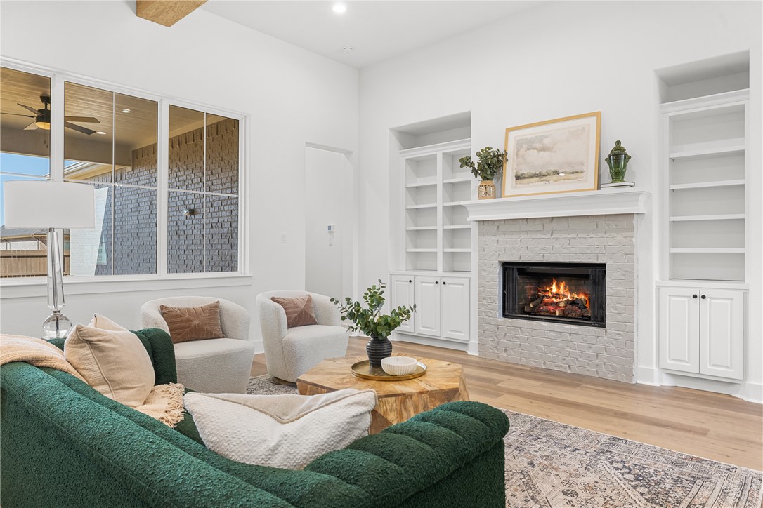 5034 Toscana Loop Bryan, TX 77802 - Photo 14 of 41 a living room with furniture and a fireplace