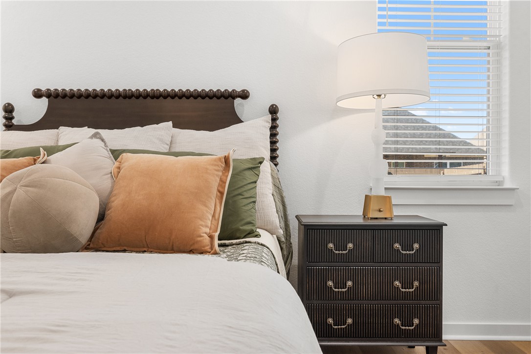 5034 Toscana Loop Bryan, TX 77802 - Photo 19 of 42 a bedroom with a bed and a window