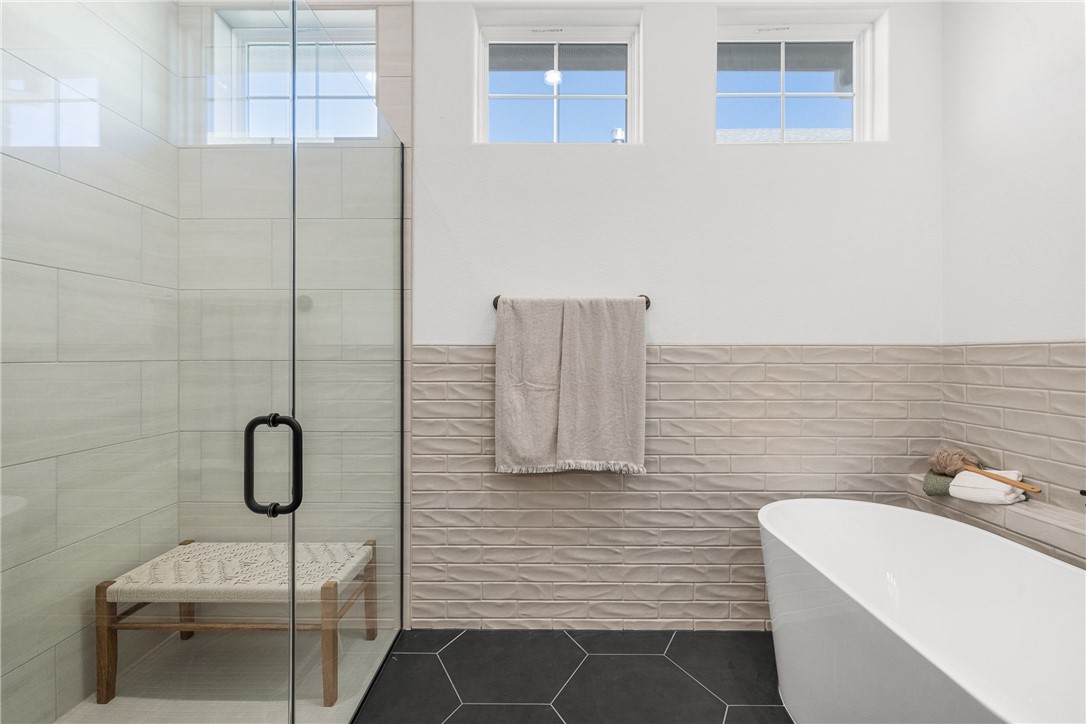 5034 Toscana Loop Bryan, TX 77802 - Photo 22 of 41 a bathroom with a sink toilet and shower