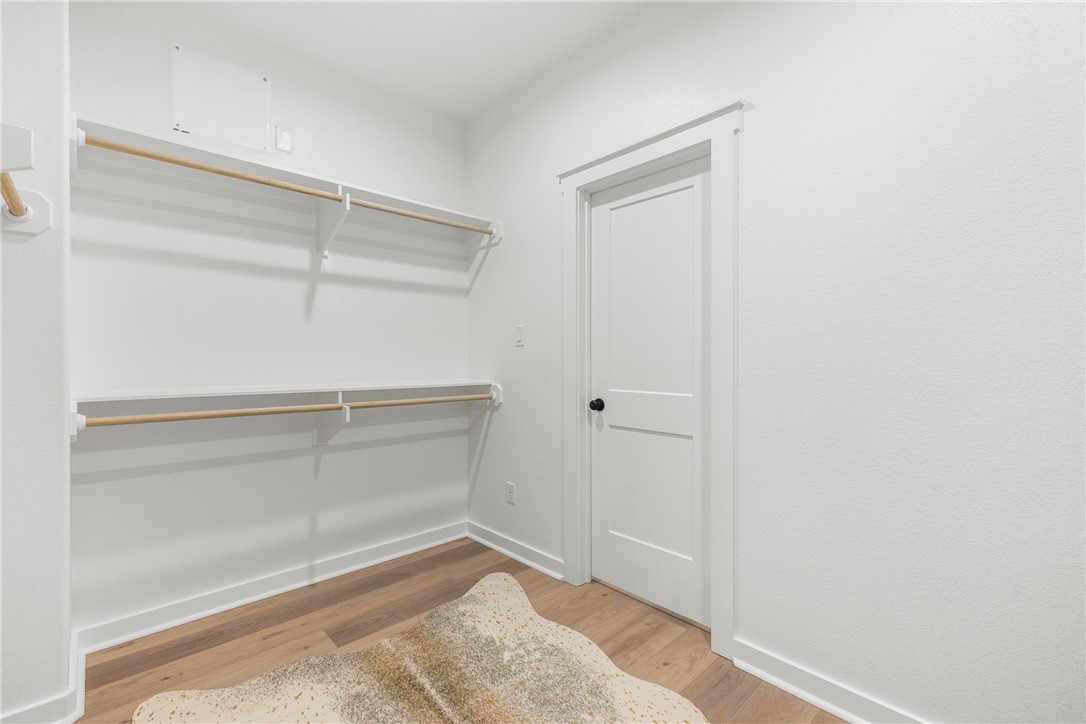 5034 Toscana Loop Bryan, TX 77802 - Photo 23 of 41 a view of an empty walk in closet