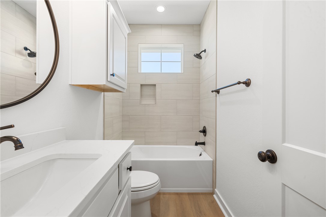 5034 Toscana Loop Bryan, TX 77802 - Photo 28 of 41 a bathroom with a sink toilet and shower