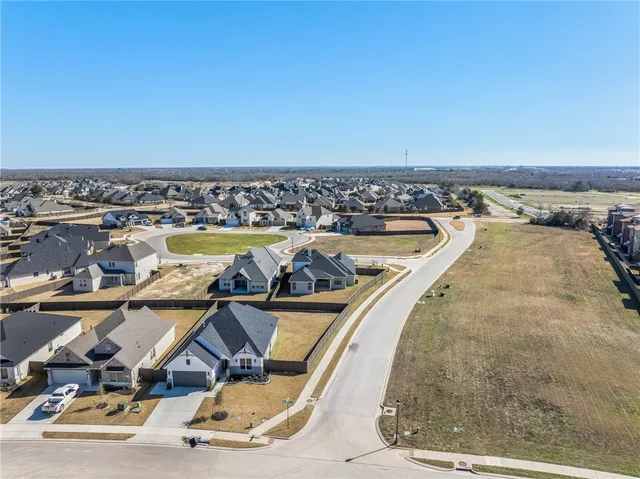 a view of a swimming pool with an ocean view