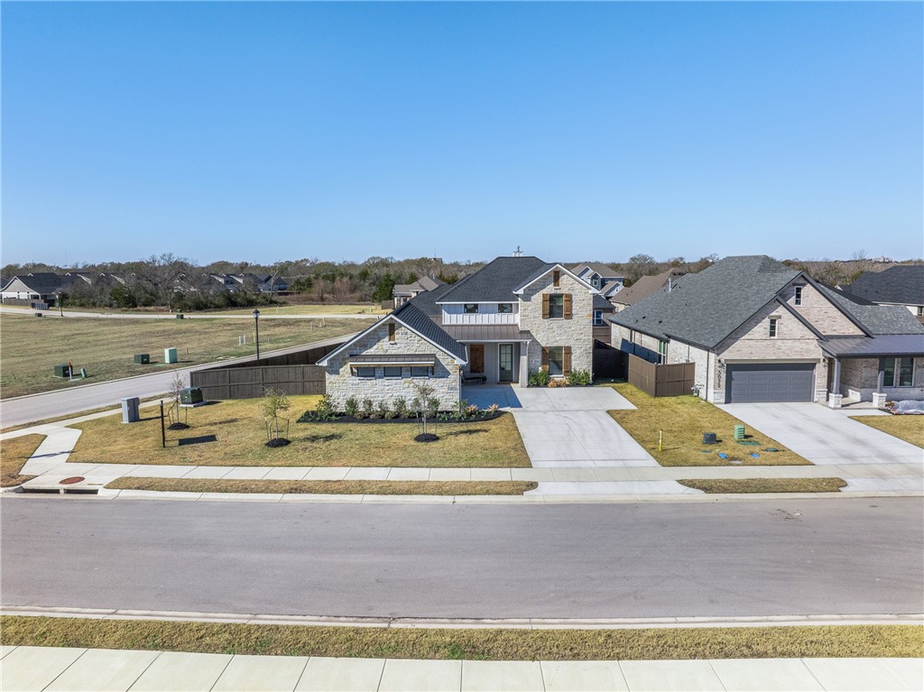 5034 Toscana Loop Bryan, TX 77802 - Photo 40 of 41 a view of a city with lawn chairs