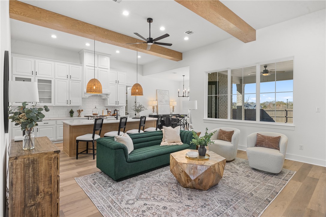 5034 Toscana Loop Bryan, TX 77802 - Photo 6 of 42 a living room with furniture and kitchen view