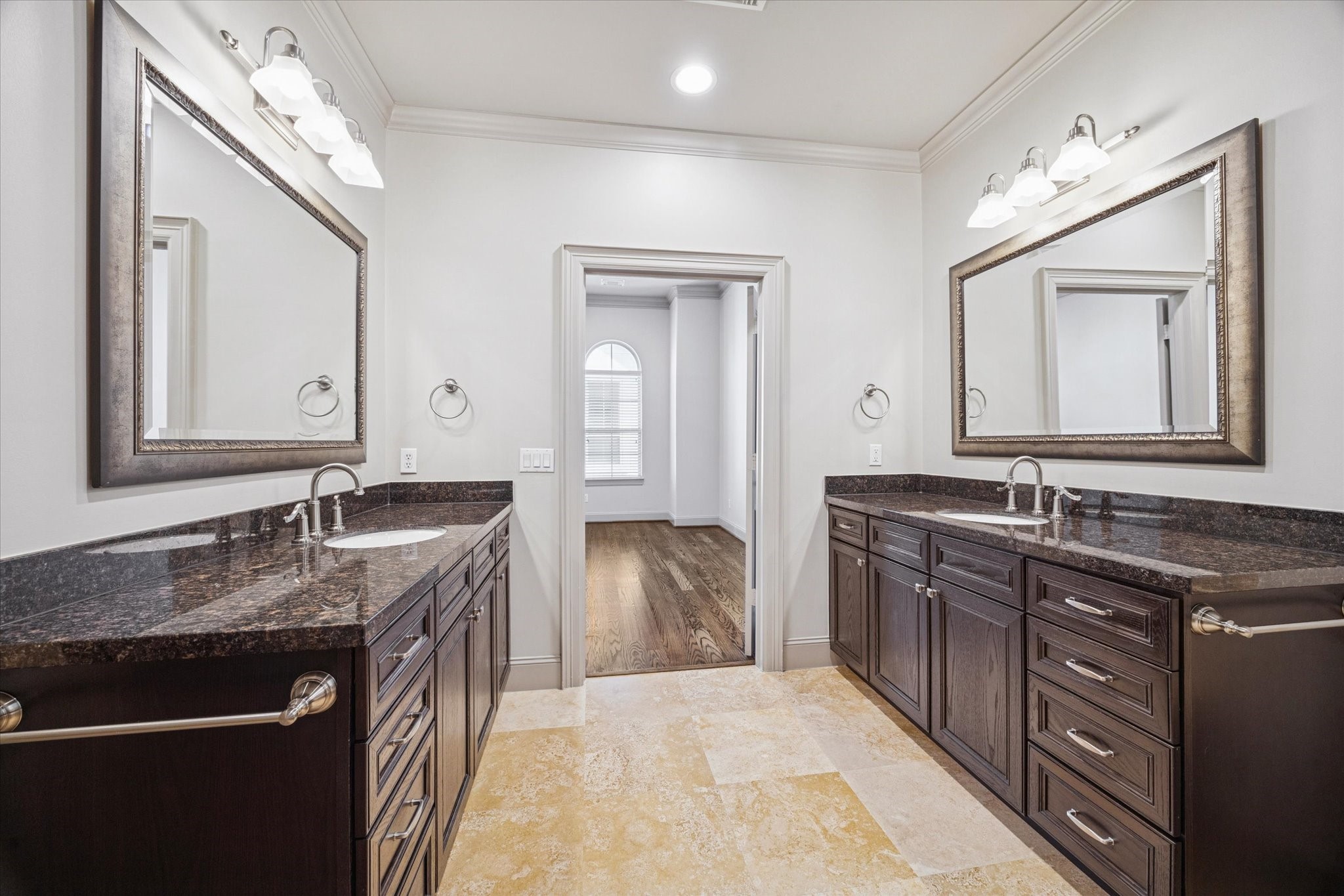 1545 Haddon Street Houston, TX 77006 - Photo 26 of 30 a en suite bathroom with a granite countertop sink and a mirror