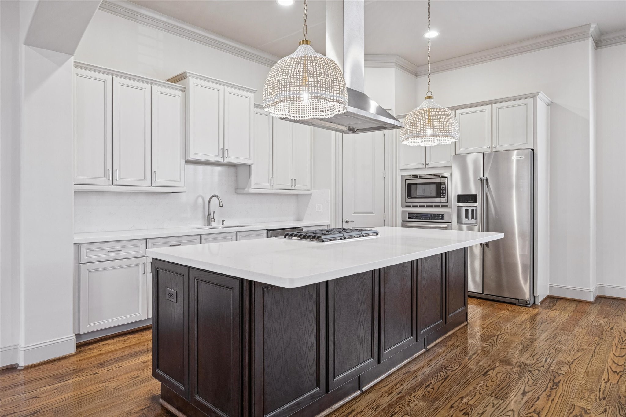 1545 Haddon Street Houston, TX 77006 - Photo 9 of 30 a kitchen with stainless steel appliances a sink stove and refrigerator