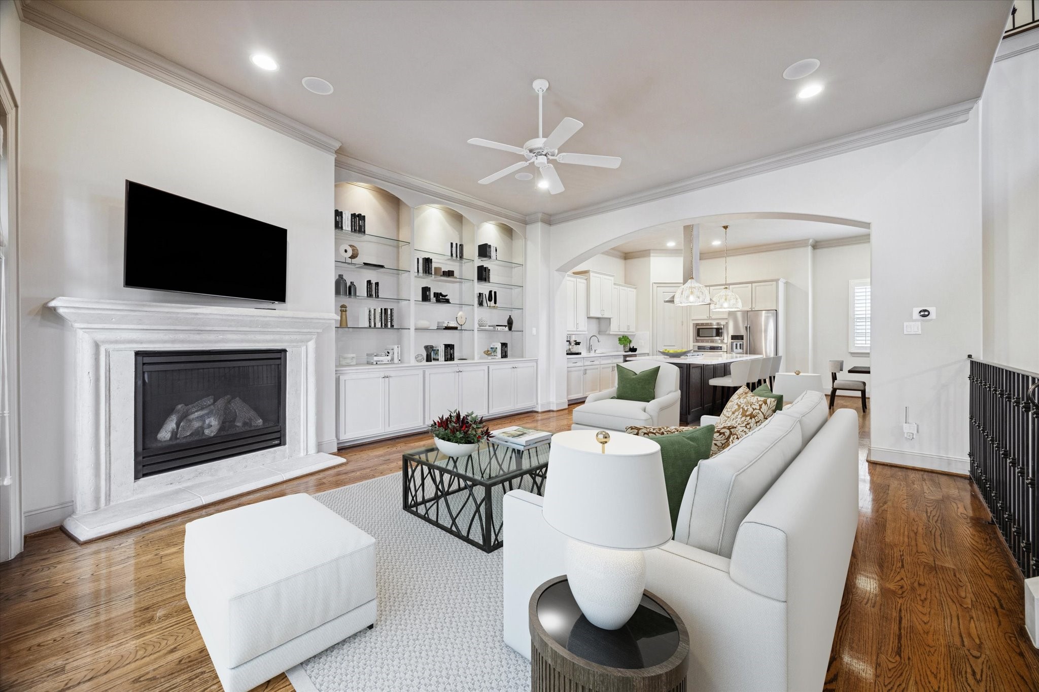 1545 Haddon Street Houston, TX 77006 - Photo 10 of 30 a living room with furniture a flat screen tv and a fireplace