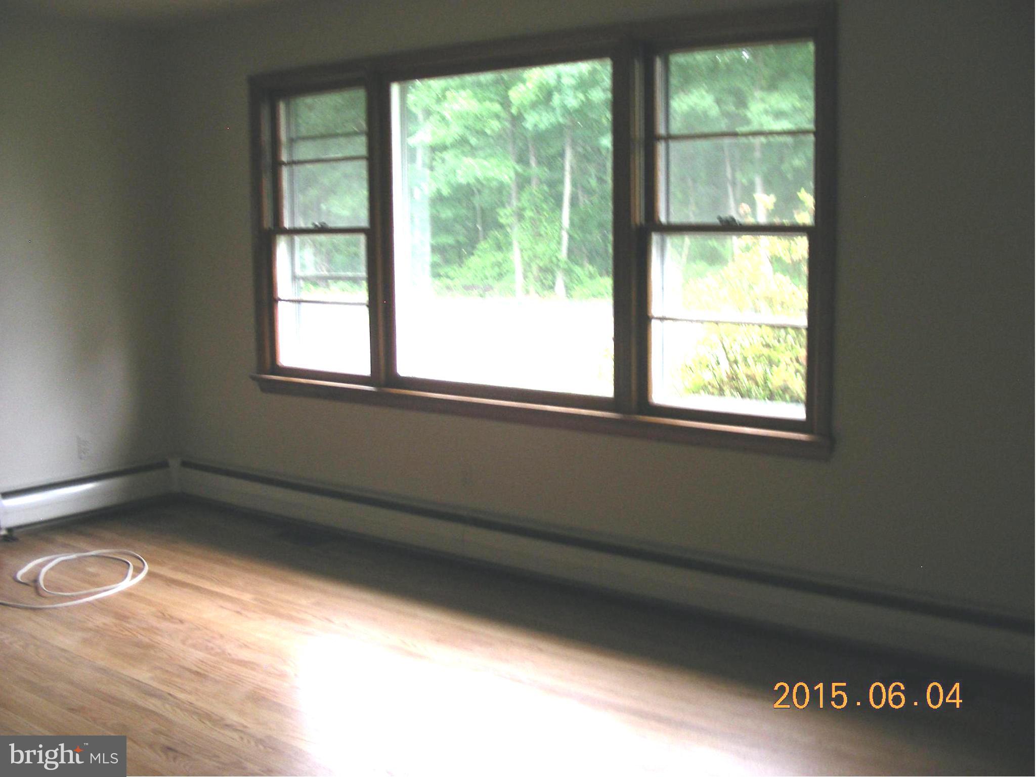16338 Waterloo Road Amissville, VA 20106 - Photo 3 of 17 a view of an empty room and window