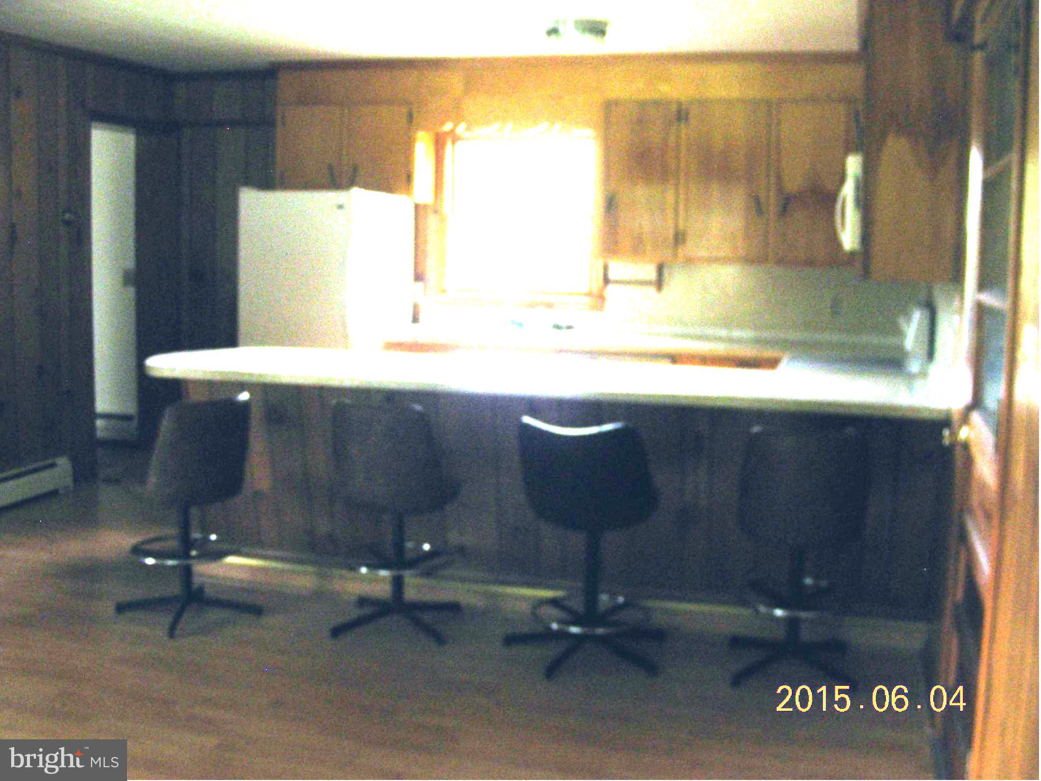 16338 Waterloo Road Amissville, VA 20106 - Photo 7 of 17 a room with a table chairs and mirrors