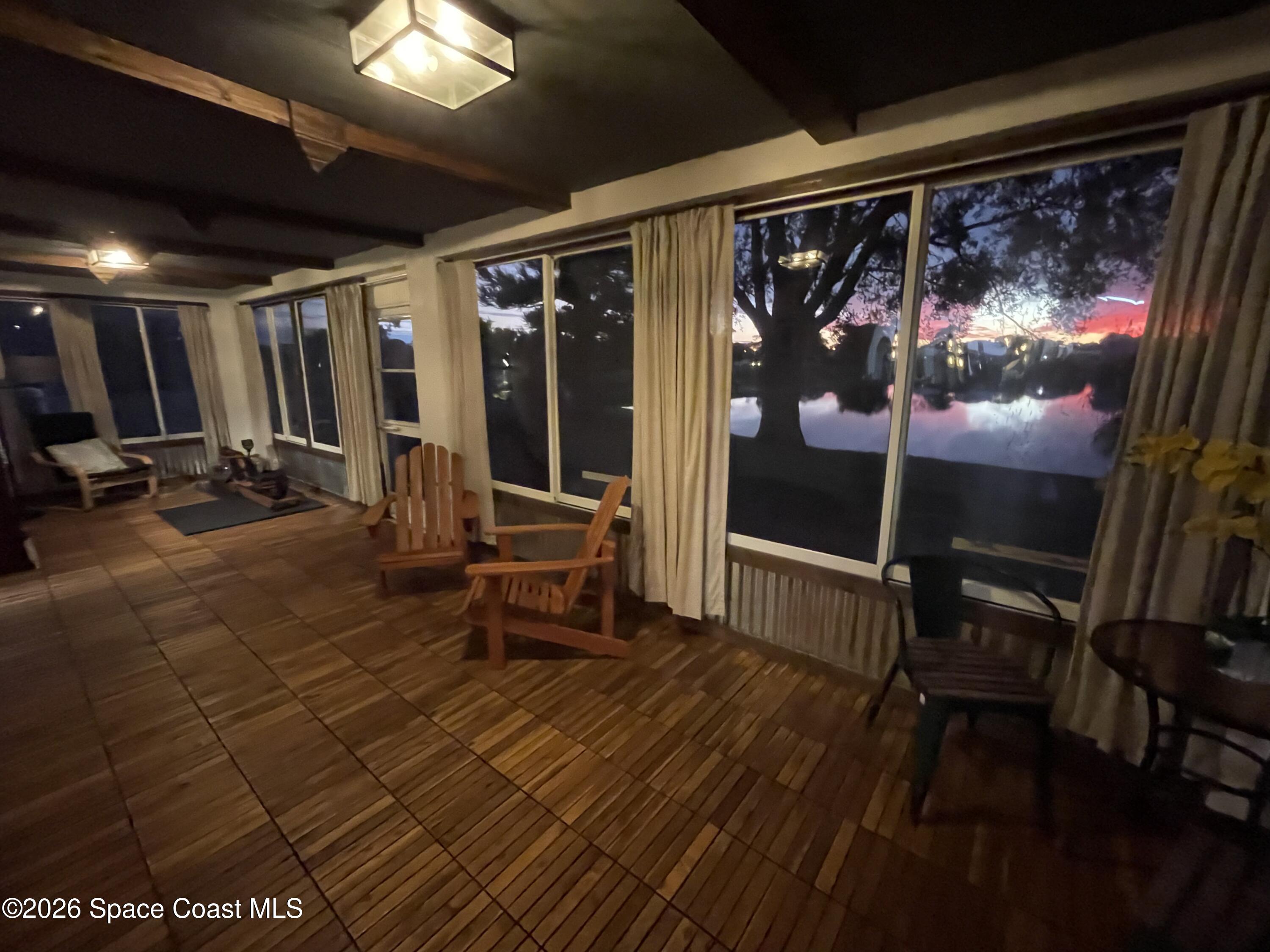 2152 Spring Creek Circle Palm Bay, FL 32905 - Photo 23 of 24 a view of a room with wooden floor
