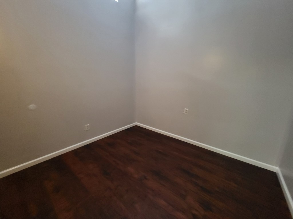 121 Harbour Lane Coldspring, TX 77331 - Photo 25 of 30 a view of an empty room with wooden floor