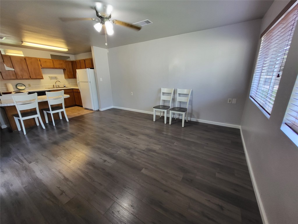 121 Harbour Lane Coldspring, TX 77331 - Photo 8 of 30 a dining room with furniture and wooden floor