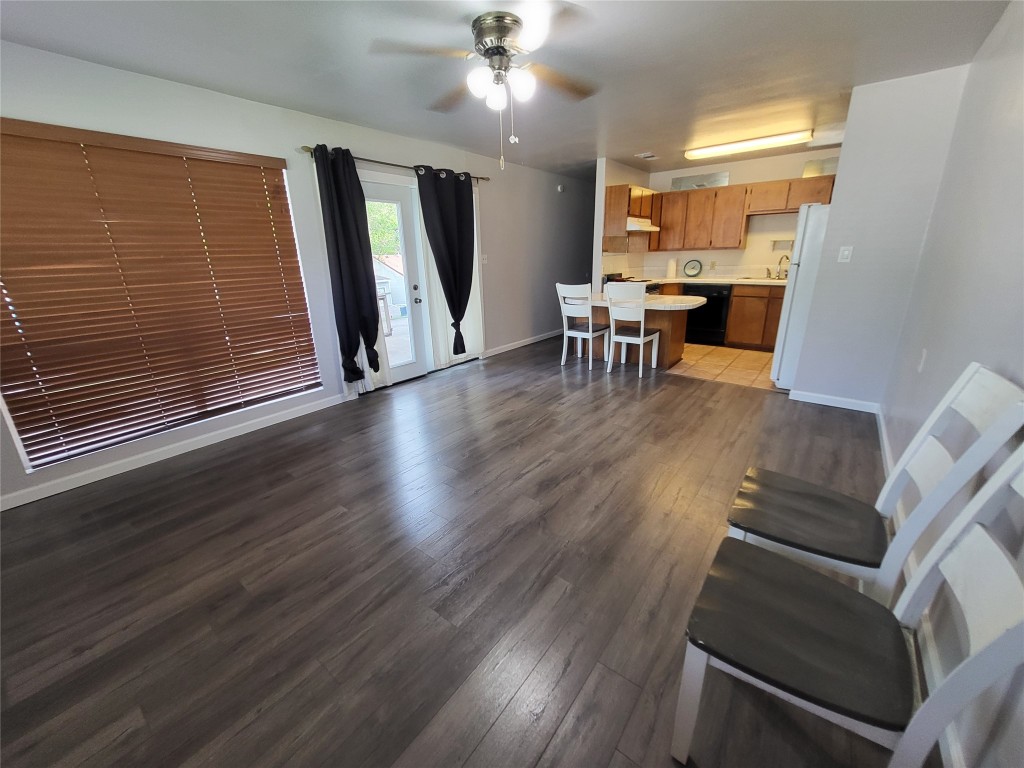 121 Harbour Lane Coldspring, TX 77331 - Photo 9 of 30 a view of a dining room with furniture window and wooden floor