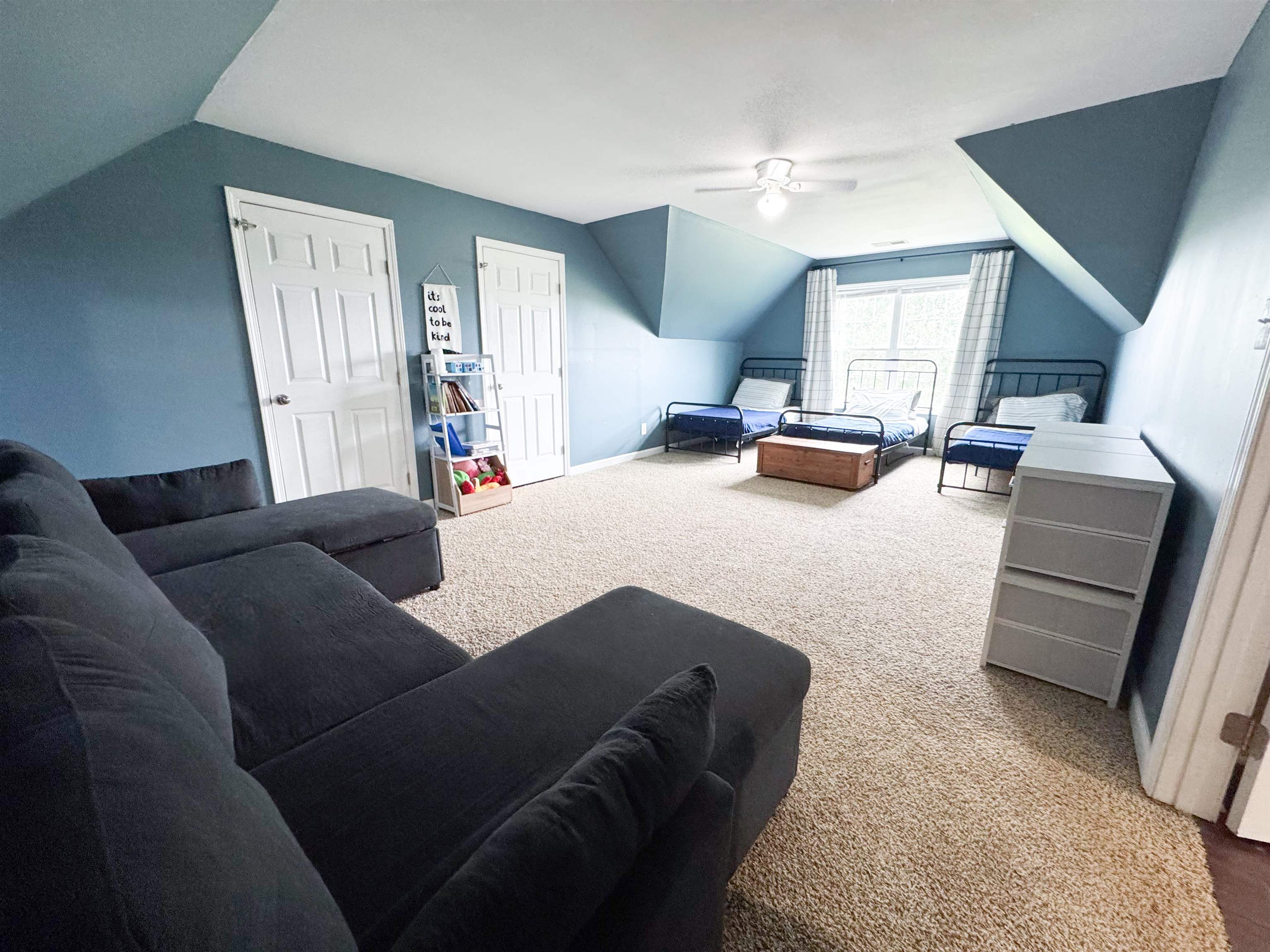 4776 Campground Road Munford, TN 38058 - Photo 10 of 25 a living room with furniture and a flat screen tv