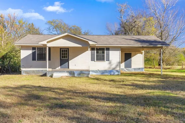a view of a house with a swimming pool