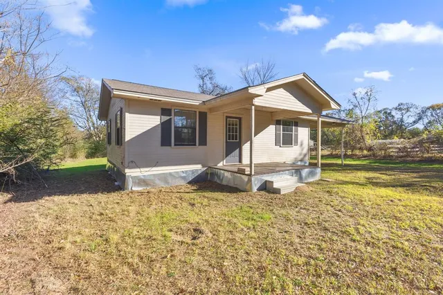 a house view with a outdoor space
