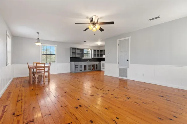 a view of a kitchen and dining room