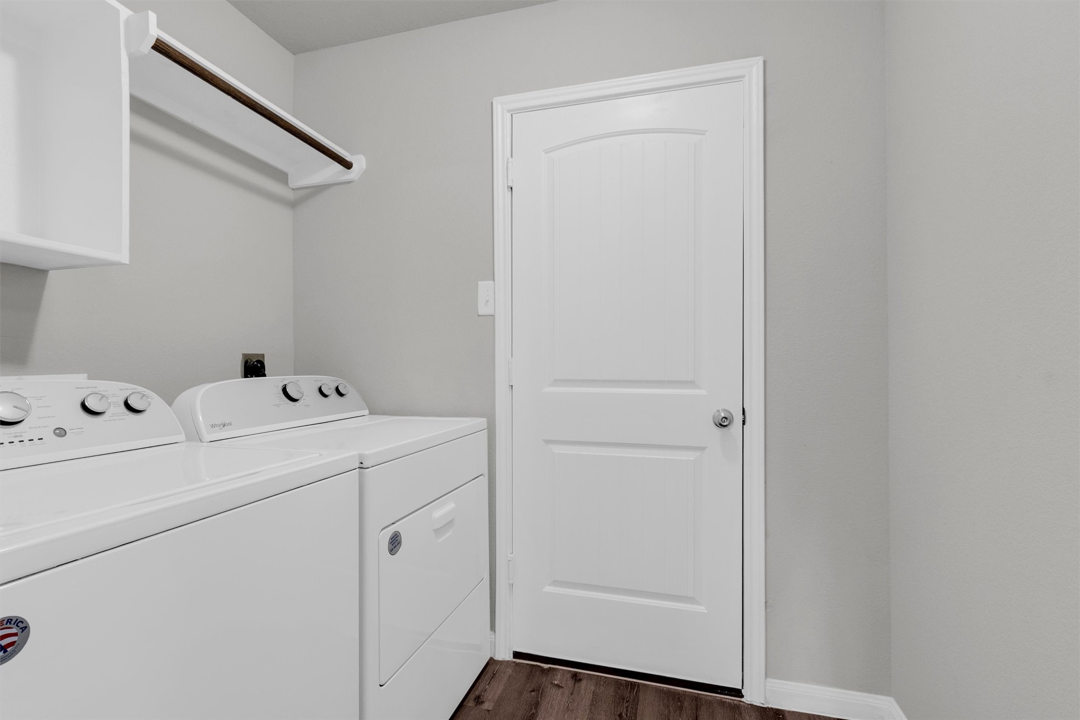 13534 Luke Prairie Willis, TX 77378 - Photo 22 of 29 Utility room w/hanging area and cabinets.