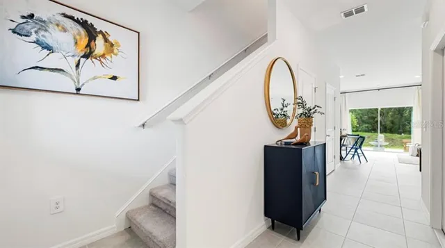 a bathroom with a sink and mirror