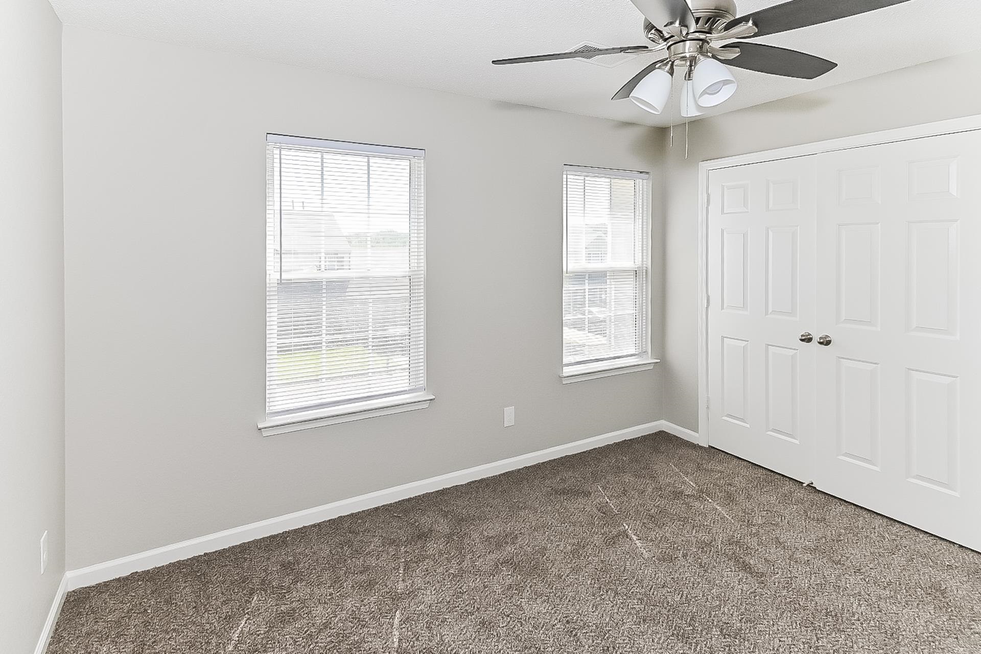 4891 Top Notch Loop Memphis, TN 38125 - Photo 10 of 17 a view of an empty room with a window