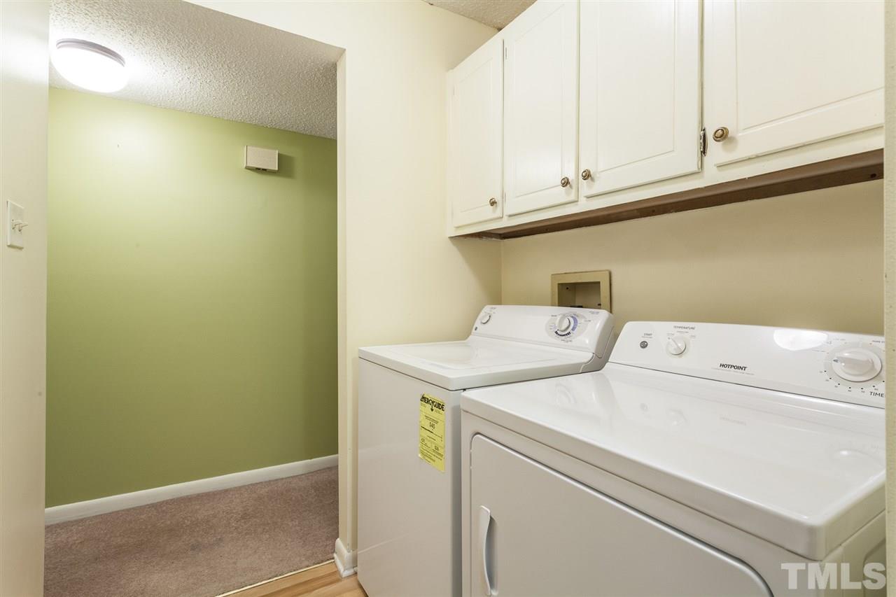 627 Pine Ridge Place, Unit NONE Raleigh, NC 27609 - Photo 15 of 21 a utility room with dryer and washer