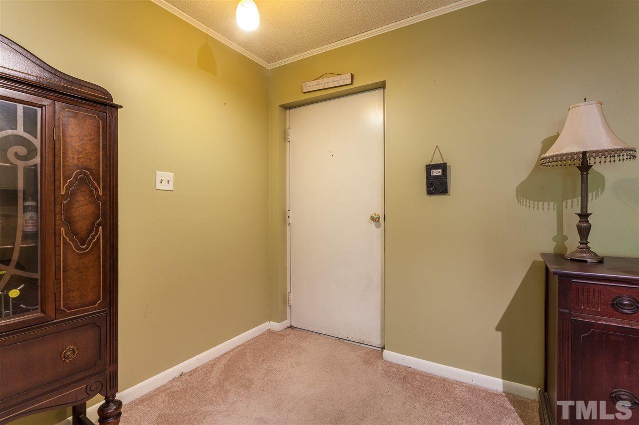 627 Pine Ridge Place, Unit NONE Raleigh, NC 27609 - Photo 6 of 21 a view of a storage & utility room with a sink