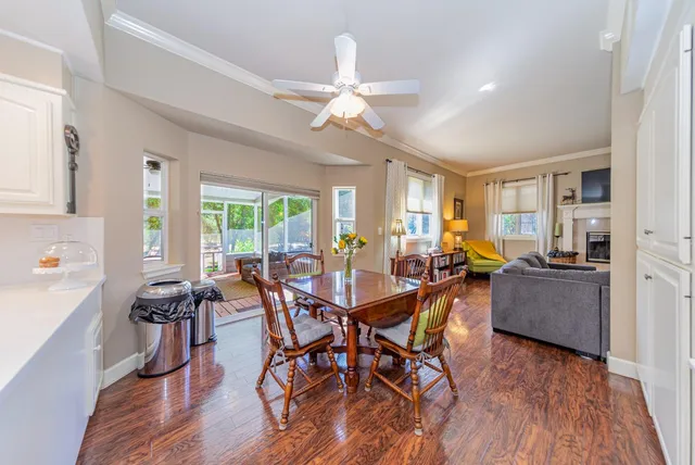 a utility room with dryer and bicycles