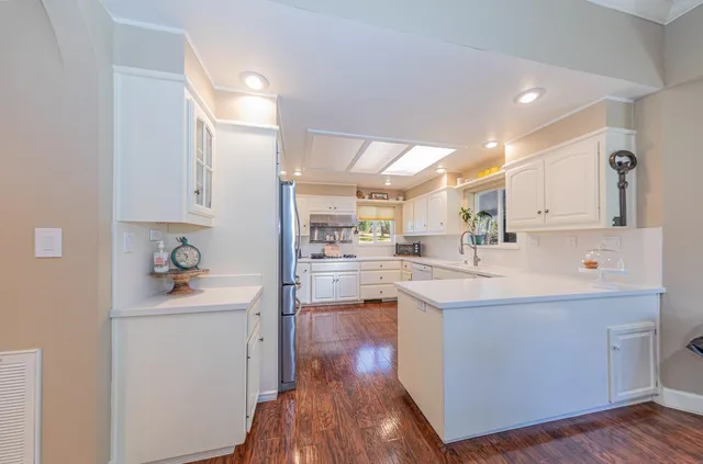 a view of a house with a tree
