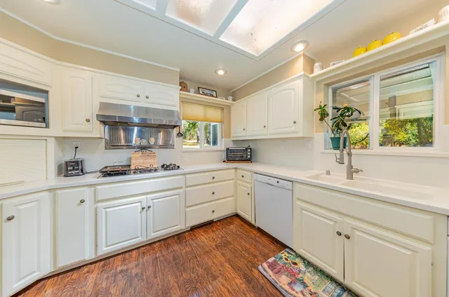 a bedroom with bed and a window