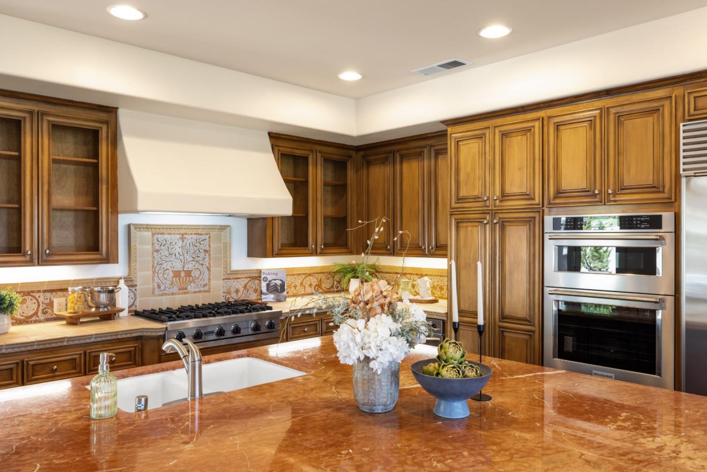 302 Pasadera Drive Monterey, CA 93940 - Photo 11 of 40 a kitchen with a stove a sink and a refrigerator
