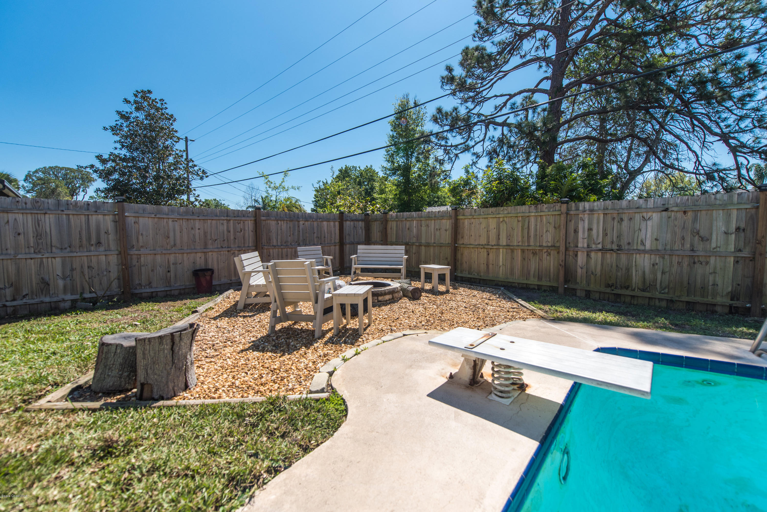 1023 Palmer Road Rockledge, FL 32955 - Photo 22 of 24 a view of a backyard with sitting area and furniture