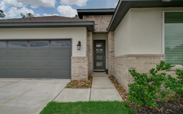 $384,999 | 10011 Angelina Woods Lane, Conroe, TX 77384