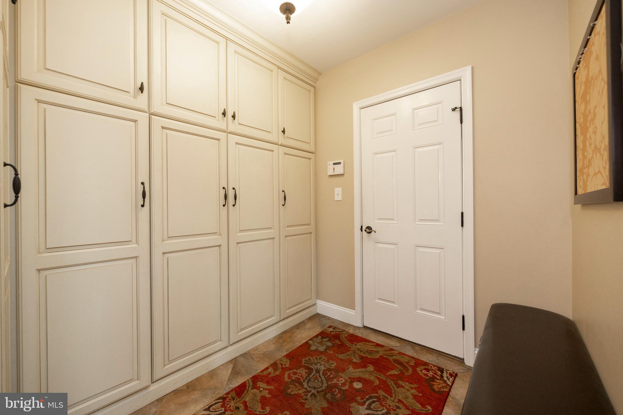 403 Prairie Lane West Chester, PA 19380 - Photo 14 of 65 Mudroom leading to garage includes custom cabinets