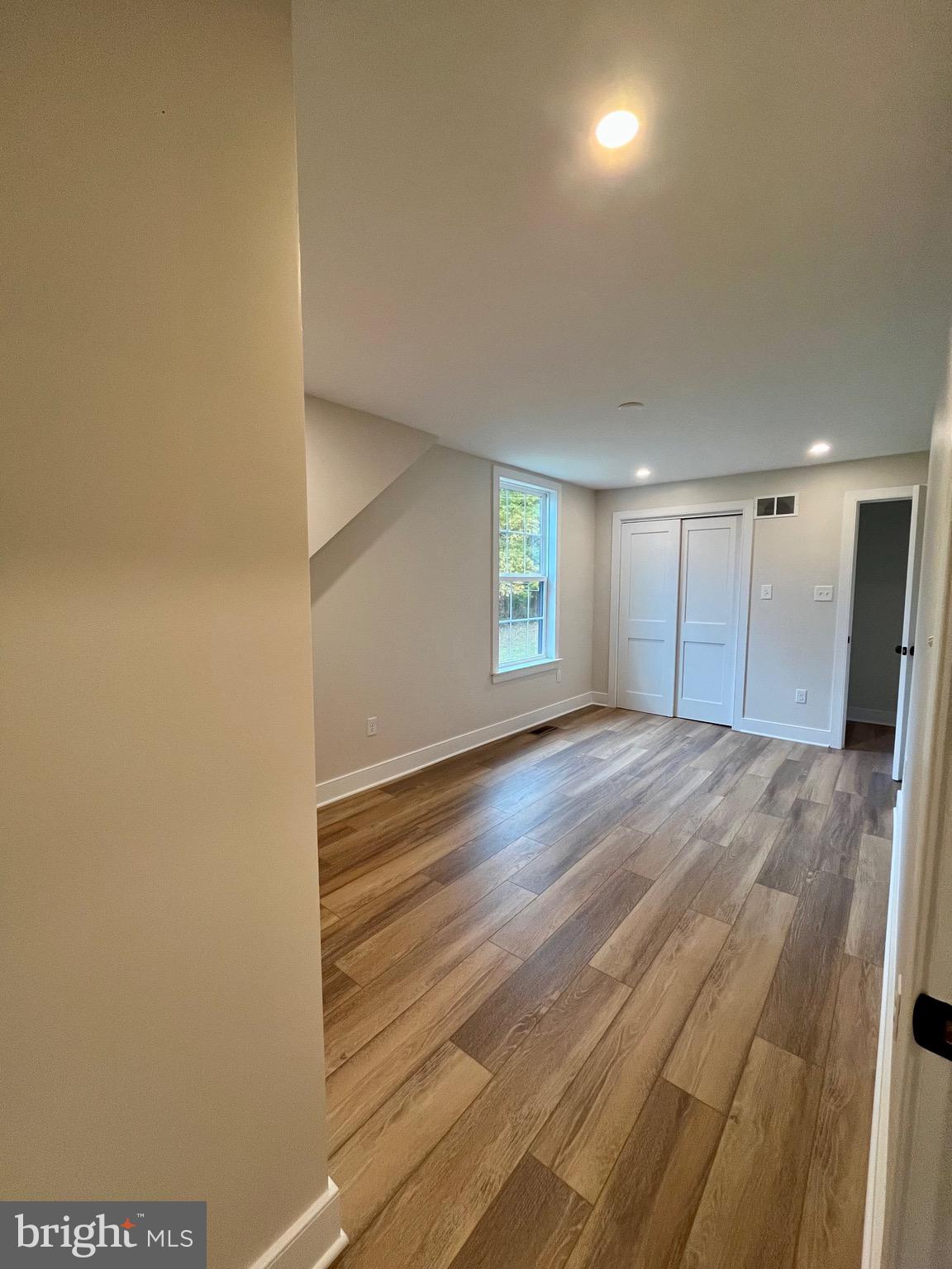 135 Center Hill Road Upper Black Eddy, PA 18972 - Photo 12 of 25 a view of empty room with wooden floor