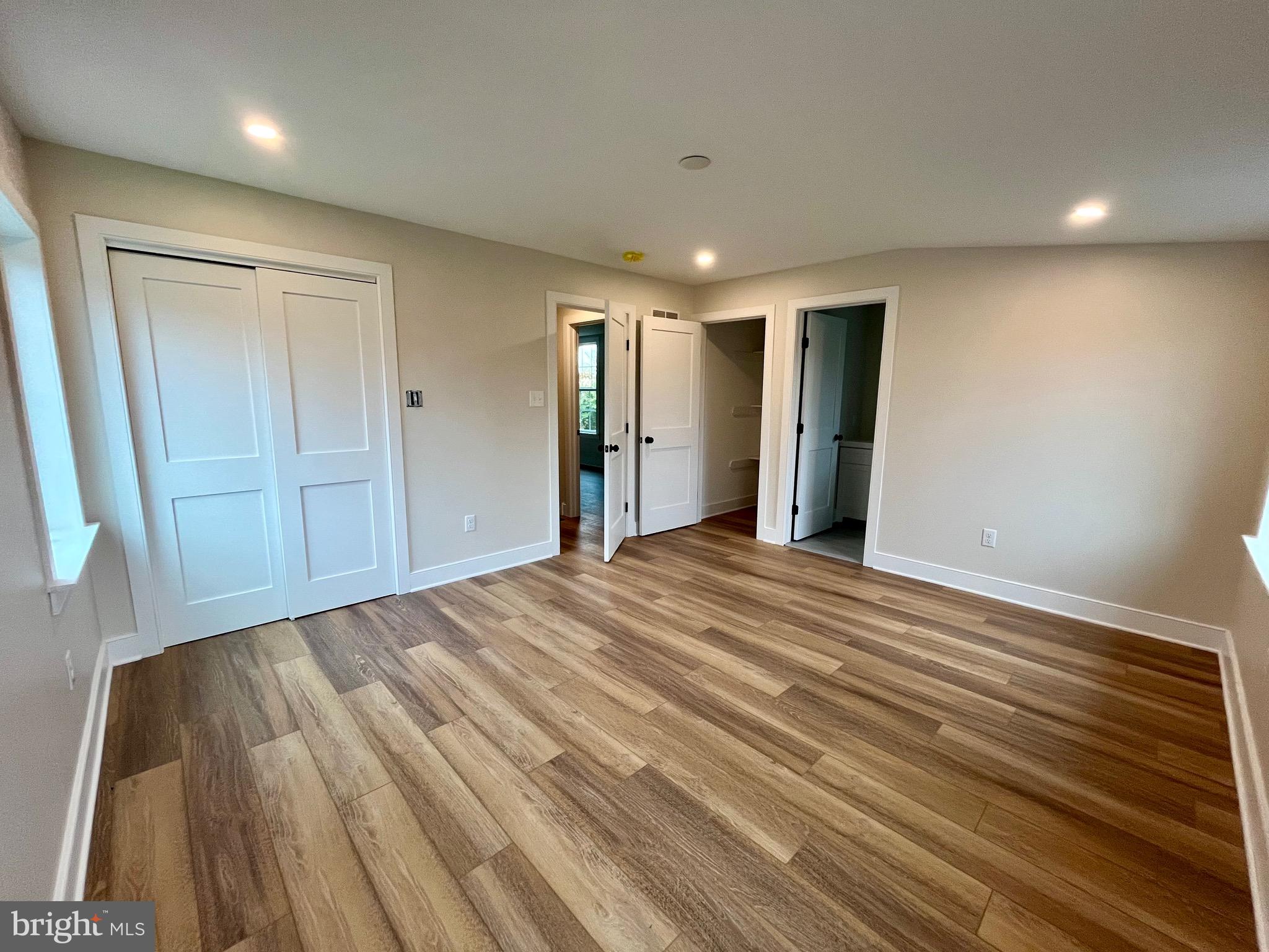 135 Center Hill Road Upper Black Eddy, PA 18972 - Photo 18 of 25 a view of a livingroom with wooden floor and closet
