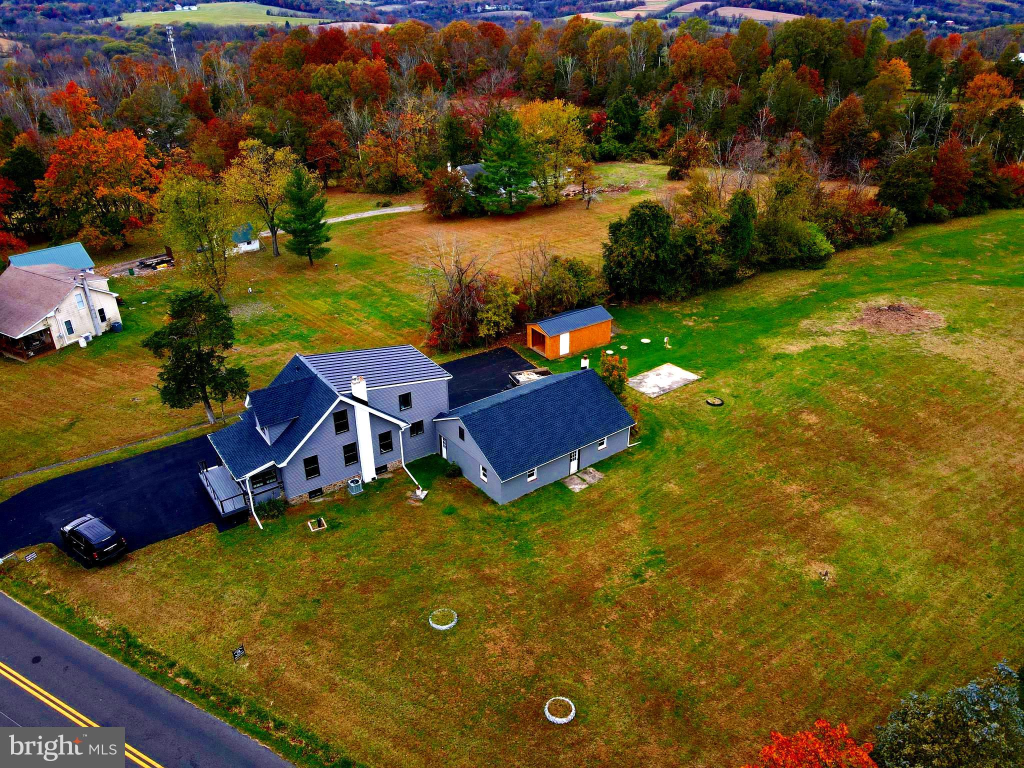 135 Center Hill Road Upper Black Eddy, PA 18972 - Photo 21 of 25 an aerial view of residential houses with yard