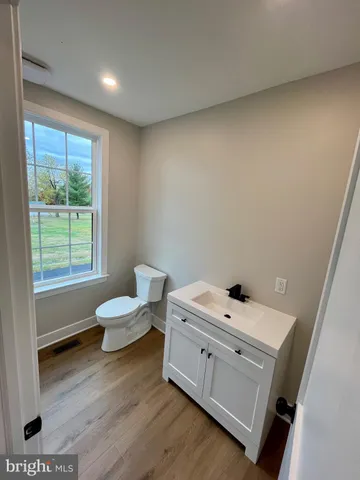 a room with a bed and a window