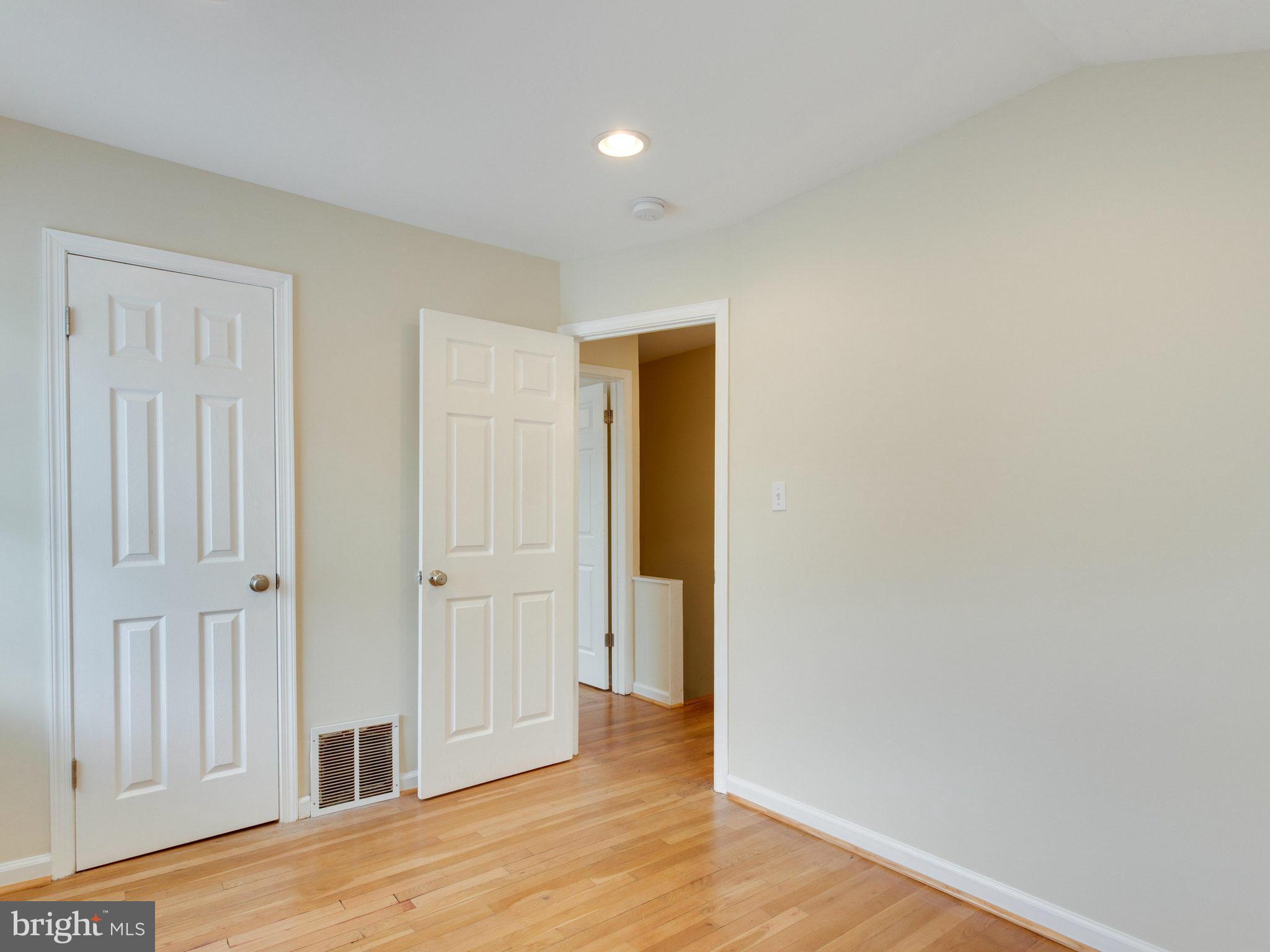 5131 Sheriff Road Northeast Washington, DC 20019 - Photo 17 of 29 a view of entryway with wooden floor