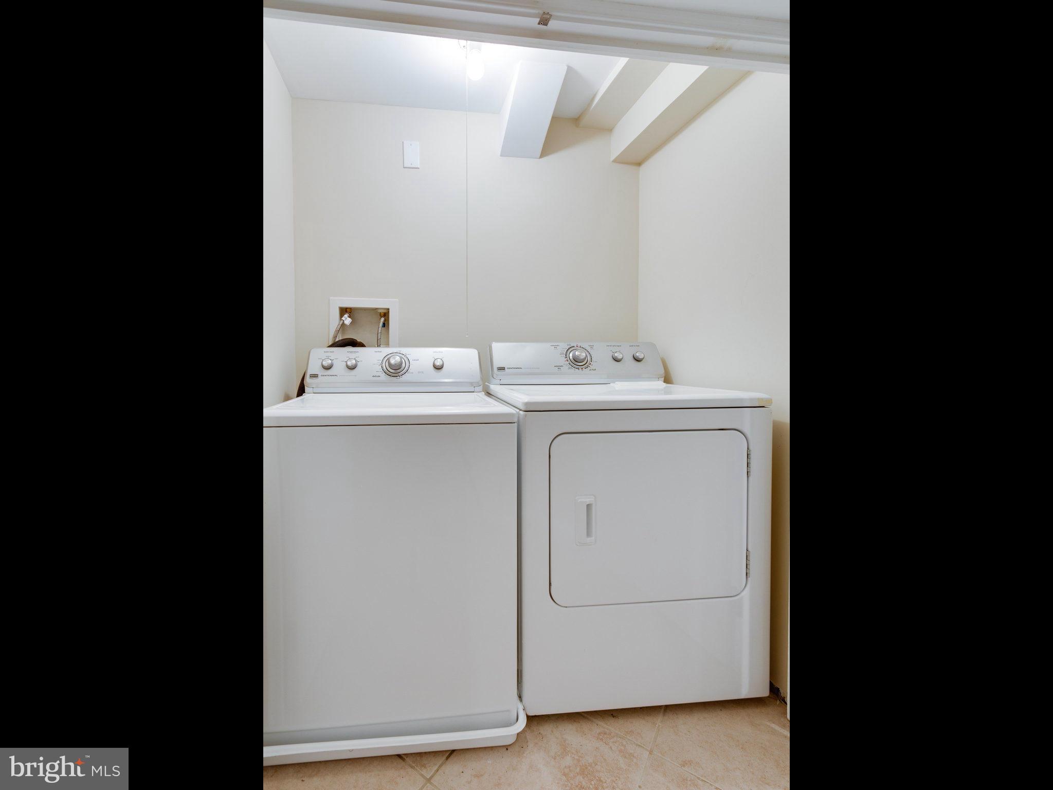 5131 Sheriff Road Northeast Washington, DC 20019 - Photo 24 of 29 a utility room with dryer and washer
