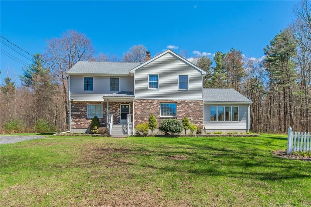 33 Babula Road Thompson, CT 06277 - Photo 1 of 1 a view of a yard in front of house