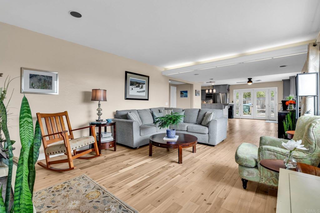 13501 Melissa Lane Poway, CA 92064 - Photo 24 of 62 a living room with furniture and a wooden floor
