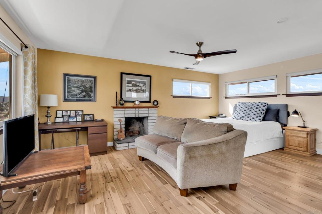 13501 Melissa Lane Poway, CA 92064 - Photo 35 of 62 a living room with furniture and a fireplace