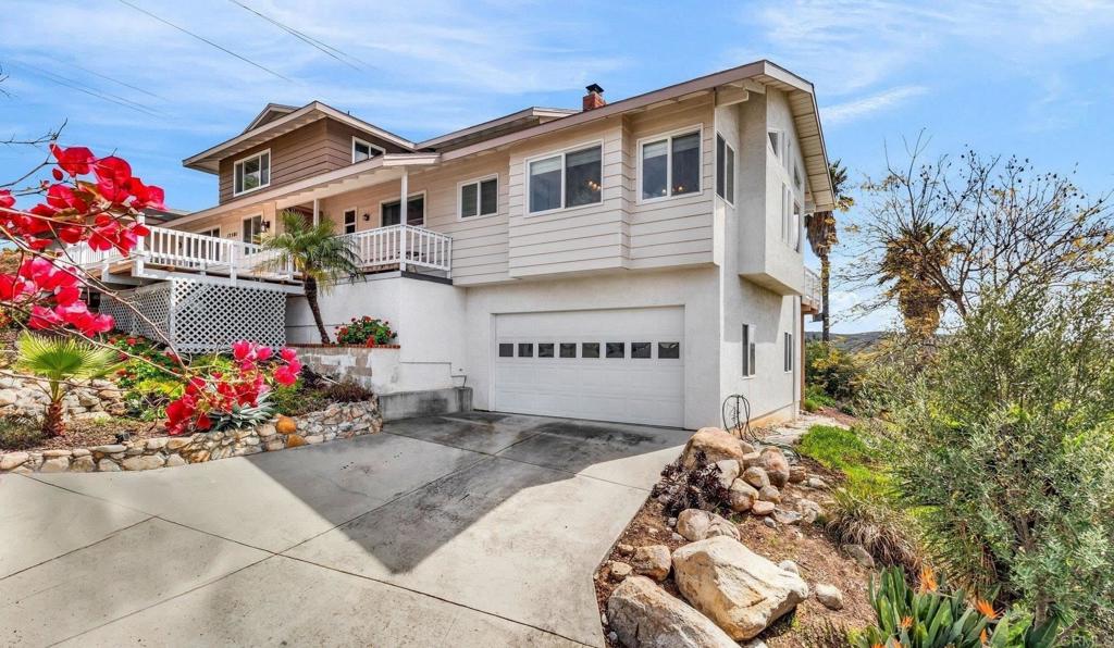 13501 Melissa Lane Poway, CA 92064 - Photo 4 of 62 a front view of a house with a yard