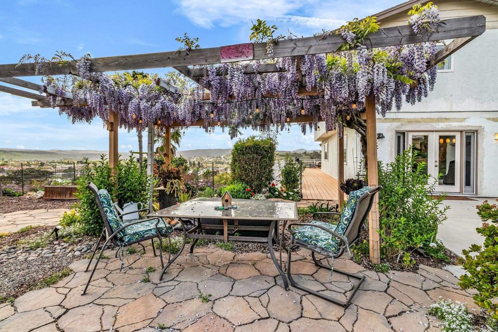 13501 Melissa Lane Poway, CA 92064 - Photo 47 of 62 a view of a chairs and table in a patio